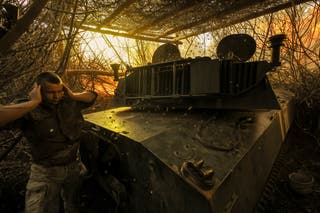 Servicemen of the 24th Mechanized Brigade, named after King Danylo, fire a 122mm howitzer 2S1 outskirts of Chasiv Yar in Donetsk region
